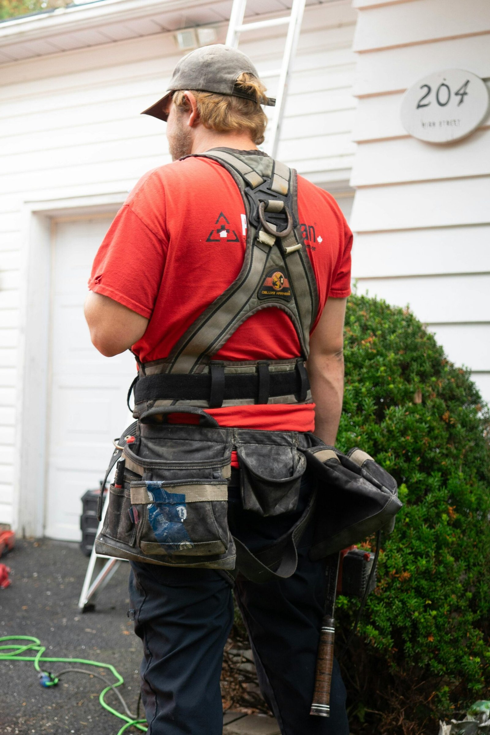 Handyman working on home exterior in Denver Colorado